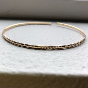 Gold Colored Bangle Bracelet with Patterned Edge